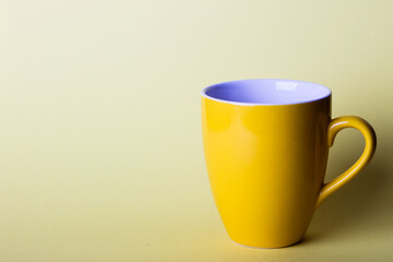 yellow cup on a yellow background