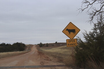 Open Range cattle sign in Barber County in Kansas out in the country.