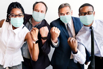 Successful business people wearing face masks at work - Powered by Adobe