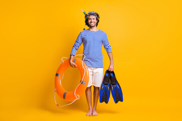 Full size photo of guy hold life buoy flippers wear snorkeling mask goggles striped shirt shorts...
