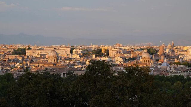 City of Rome at sunset in Italy, cityscape from Janiculum Hill (Gianicolo), zoom out view