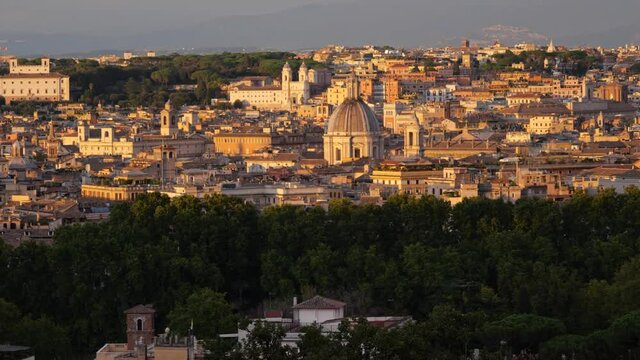 City of Rome at sunset in Italy, cityscape from Janiculum Hill (Gianicolo), panning view panorama