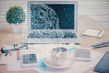 Double exposure of desktop with computer and brain drawing hologram. Artificial intelligence concept.