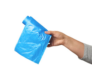 female hand holds a bundle of blue plastic bags for garbage