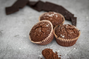 
Chocolate muffins with powdered sugar