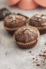 
Chocolate muffins with powdered sugar