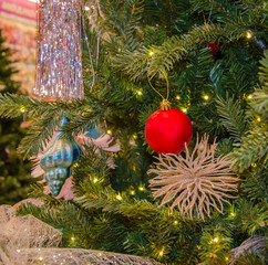 Christmas tree with toys in the store selective focus