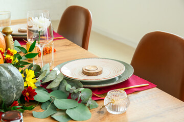 Beautiful table setting for Thanksgiving Day celebration in dining room
