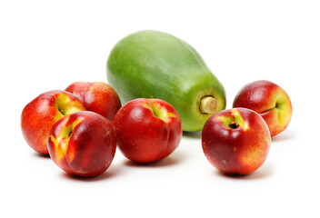 nectarine and papaya and banana on white background