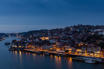 Night view of the old town of Porto and the douro river.