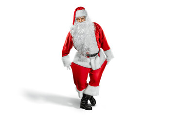 Santa Claus in a red suit on a white background isolate. Concept for Christmas Eve, Vacation, Festive Banner, New Year.