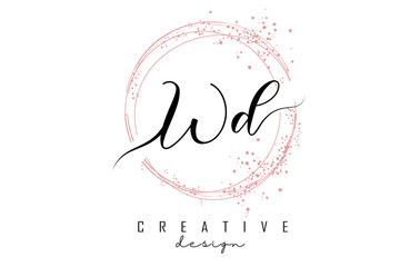 Handwritten WD W D letter logo with sparkling circles with pink glitter.