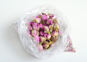 Dried rose buds isolated on white background