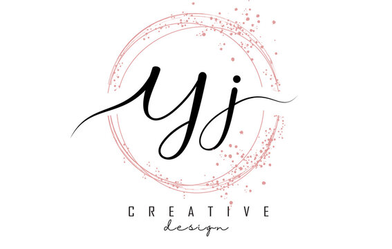 Handwritten YJ Y J letter logo with sparkling circles with pink glitter.