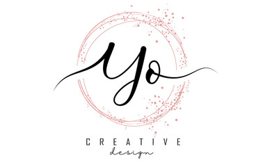 Handwritten YO Y O letter logo with sparkling circles with pink glitter.