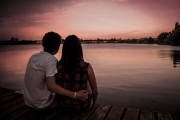 couple on the pier at sunset