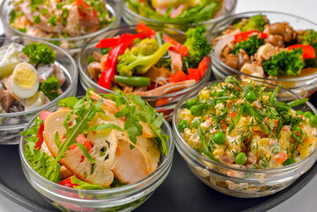 Healthy food - mix vegetable salad served in a bowl over white background. Healthy eating, delicious snack or sinner.