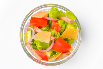 Healthy food - mix vegetable salad served in a bowl over white background. Healthy eating, delicious snack or dinner.