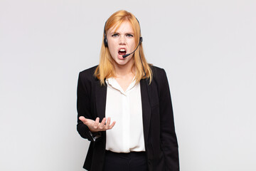 pretty woman  looking angry, annoyed and frustrated screaming wtf or what’s wrong with you