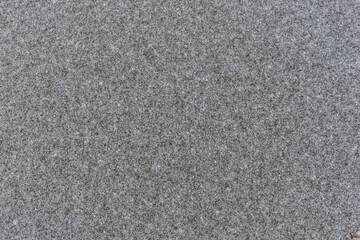 Ice with snow. Gray background