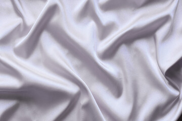 Smooth elegant gray silk with soft folds can be used as background