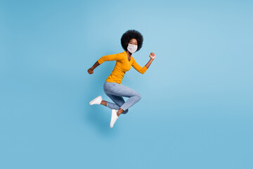 Fototapeta na wymiar Photo portrait full size of woman running jumping up use medical respirator isolated on pastel blue colored background