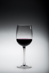 A glass of wine on white background