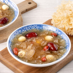 Close up of sweet snow white fungus soup with lotus seed, Chinese red dates and wolfberry.