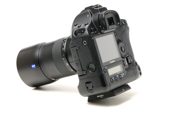 DSLR camera on white background.