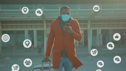 African American Tourist Walking Out of Airport with Suitcase Checking Plenty of Notifications during Business Trip. Social Media Icon. User Interface. Influencer. Vlogging Concept. - Powered by Adobe