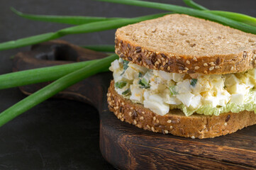 sandwich with egg salad on wholegrain bread.