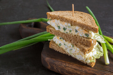 sandwich with egg salad on wholegrain bread.