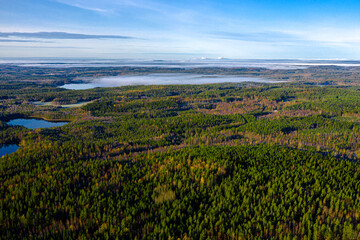 Obraz premium Finland landscape from the air with drone, lakes and pine forest