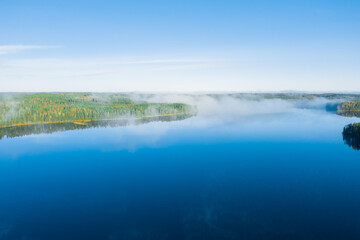 Early sunny morning
, fog over the lake. Finnish nature