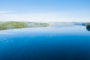 Finland landscape from the air with drone, lakes and pine forest