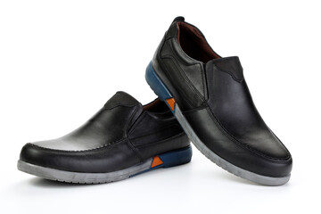 A pair of classic black men's shoes on a white background