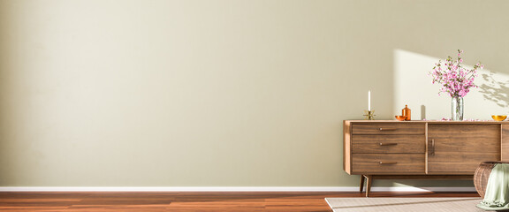Interior scene: wooden sideboard with cherry flowers, bowls and a candle on top. Wicker basket and...