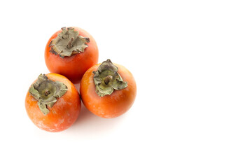 Tasty fresh persimmon isolated on white background.
