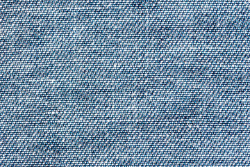 Blue jeans texture. Fabric structure background. Clothing textile pattern. Closeup fashion material.