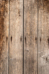 Old grunge weathered wooden boards closeup as wooden background