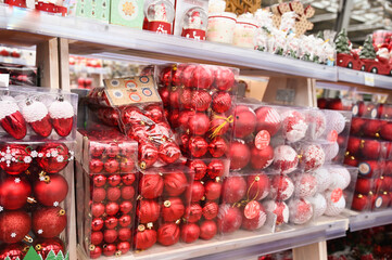 Red christmas balls on store shelf