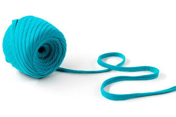 Skein of turquoise knitted yarn isolated on white background