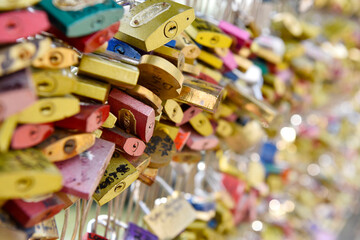 Fototapeta na wymiar Love Padlocks at Pont des Arts in Paris, France