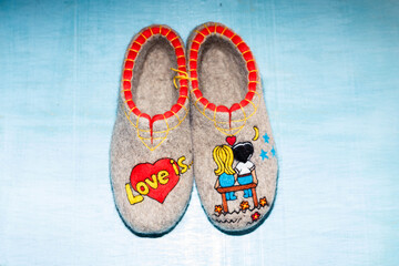 Slippers made of wool,embroidered by the method of felting