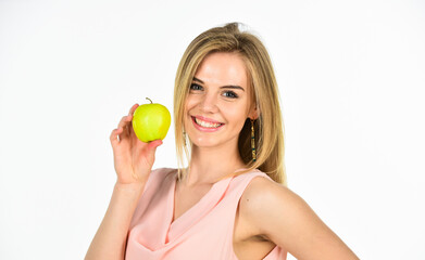 Optimistic woman. Healthy smile. Dentistry concept. Teeth whitening. Woman hold apple. Fresh and...