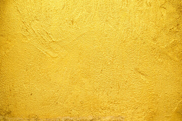 Golden wall texture rough background abstract concrete floor or Old cement grunge background with Gold empty.