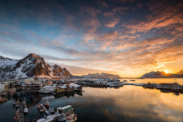 View over the port of Svolvaer on the Lofoten islands in colorful early morning sunrise in winter...