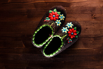Slippers made of wool,embroidered by the method of felting