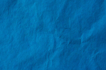 Blue crumpled paper texture background.