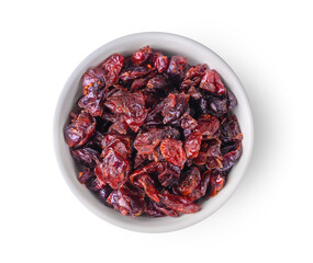 Bowl of dried cranberries isolated on white background